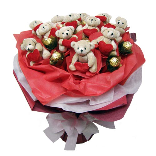 Ankara Eryaman çiçek firmamızdan Yılbaşı hediyesi 11 adet kalpli ayı buketi